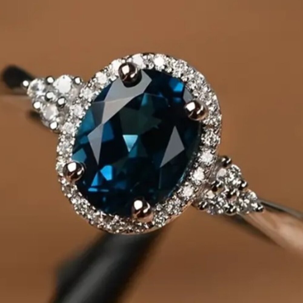 Dazzling 2 carat Blue Oval Lab Created Blue Gemstone & Cubic Zirconia Ring